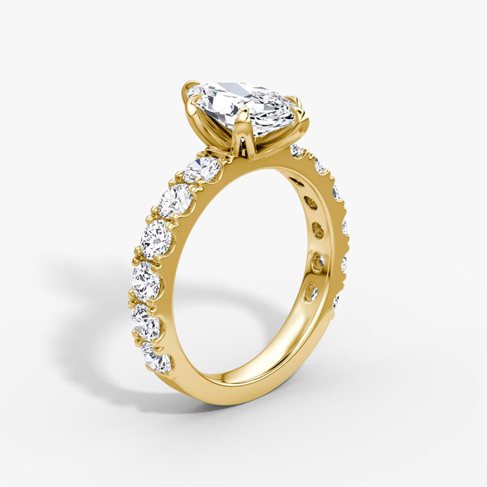 18K  Gold Ring Set with an Oval-Cut Diamond