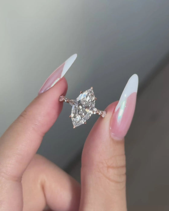 Solitaire Marquise Diamond Ring with Accent Stones