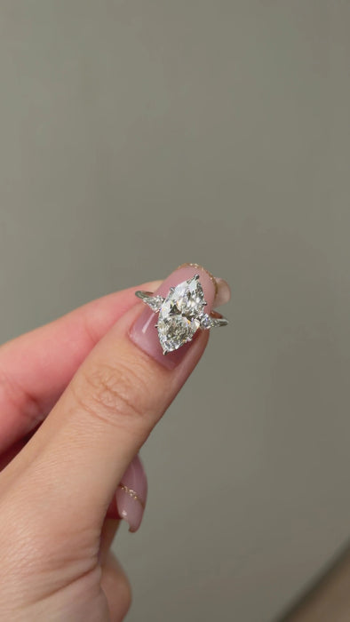 Marquise Diamond Ring with Kite Shaped Side Stone