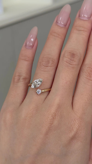 Marquise and Round Cut Twist Diamond Ring