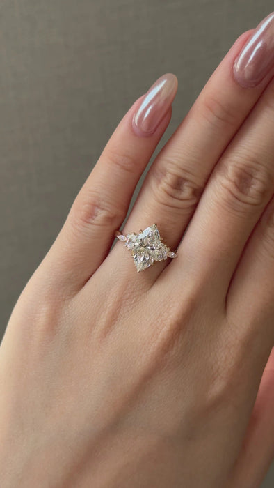Marquise Cut Diamond Ring with Side Stones