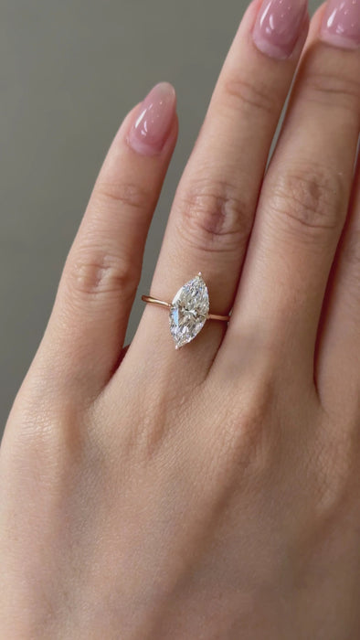 Marquise Cut Diamond Ring with Hidden Halo