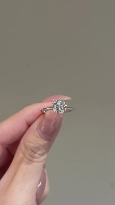 Solitaire Round Cut Diamond Ring with Knife Edge