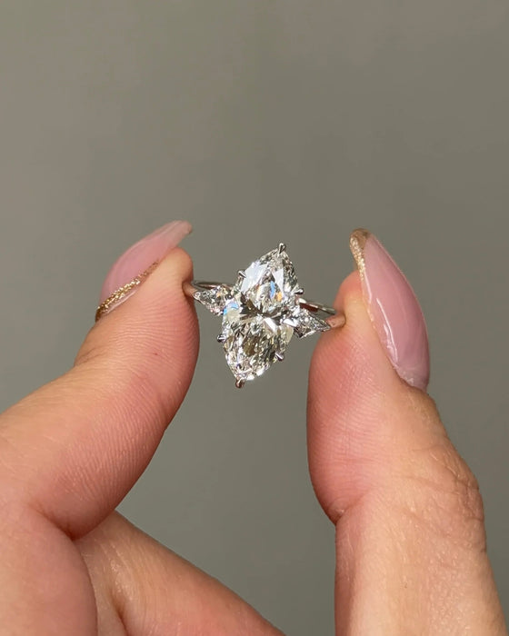 Marquise Diamond Ring with Kite Shaped Side Stone