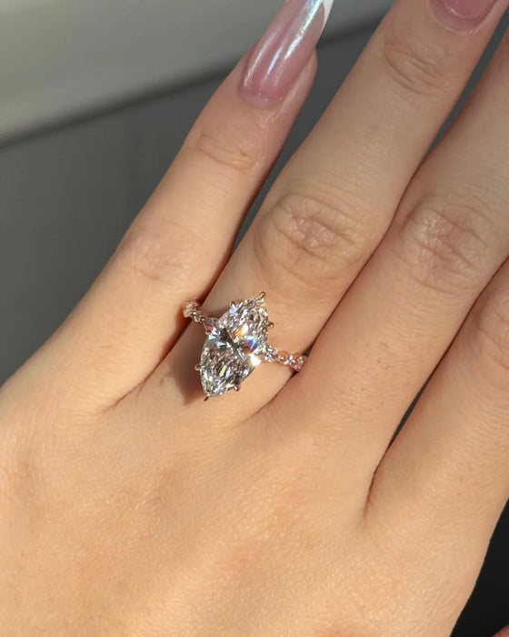 Solitaire Marquise Diamond Ring with Accent Stones