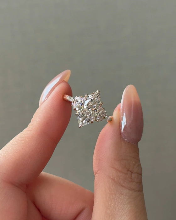 Marquise Cut Diamond Ring with Side Stones