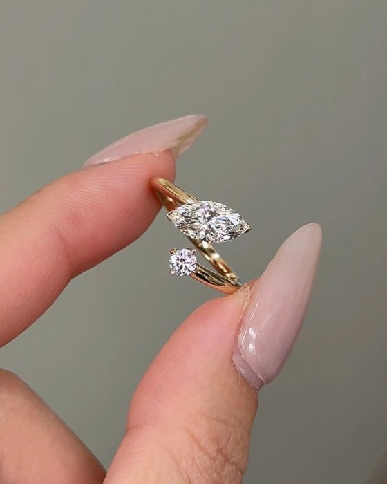 Marquise and Round Cut Twist Diamond Ring