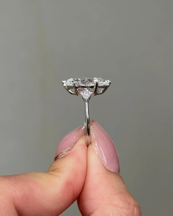 Marquise Diamond Ring with Kite Shaped Side Stone