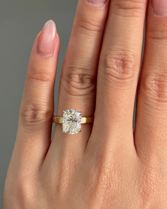 Solitaire Cushion with Cigar Band Diamond Ring