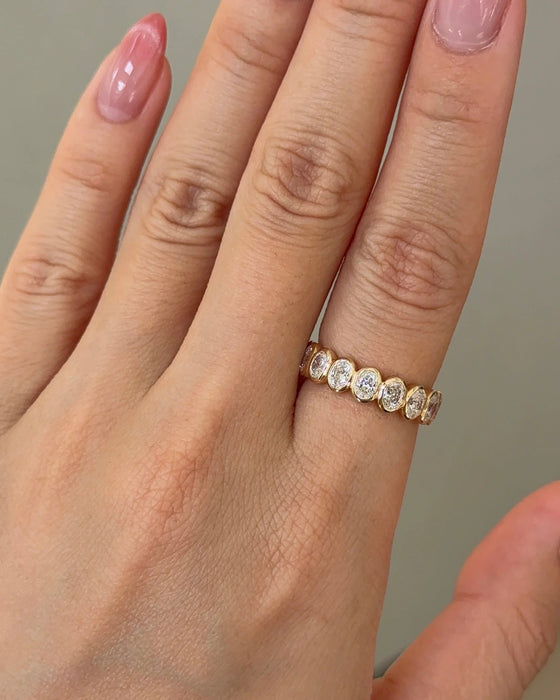 Oval Cut Bezel Diamond Half Eternity Band