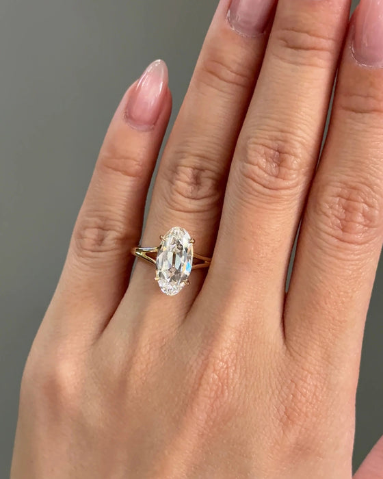 Moval Cut Split Shank Diamond Ring with Hidden Halo