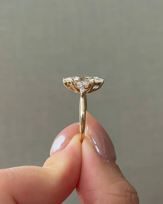 Marquise Cut Diamond Ring with Side Stones