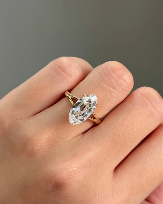 Moval Cut Split Shank Diamond Ring with Hidden Halo