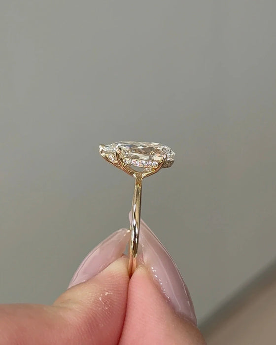 Solitaire Pear Cut Diamond Ring with Hidden Halo